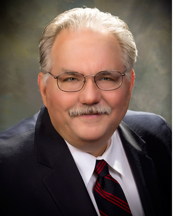 Douglas E. Kuthy